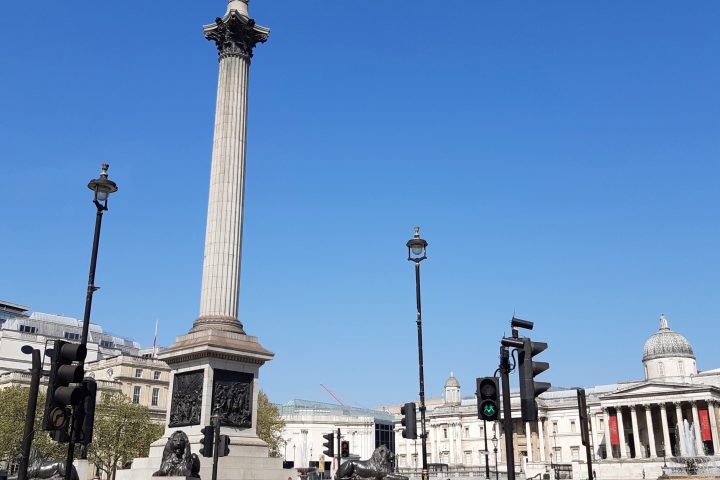 a group of people standing in front of a building