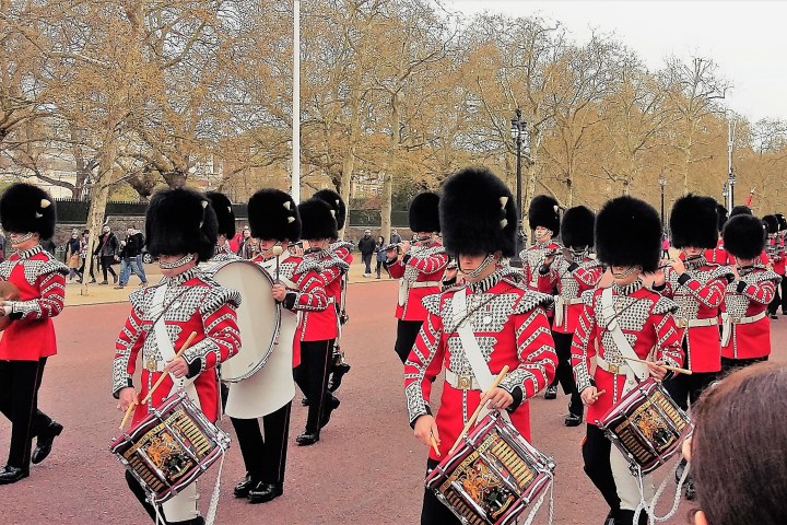 a group of people standing in front of a crowd
